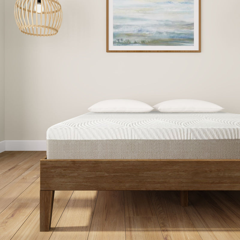 Modern bedroom with a stylish platform bed and comfortable white mattress.