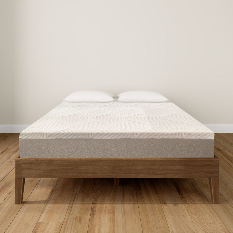Modern memory foam mattress on a stylish wooden bed frame in a cozy bedroom setting.