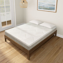 Modern bedroom with a stylish memory foam mattress on a wooden frame, near a large window and wall art.