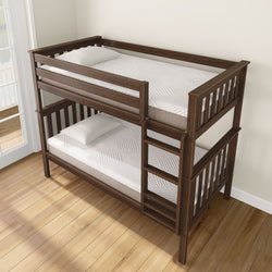 Dark wood bunk bed with white mattresses and built-in ladder in a bright room with light wood flooring.