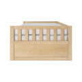 Light oak wooden toddler bed frame with slatted rails and white mattress, modern nursery furniture