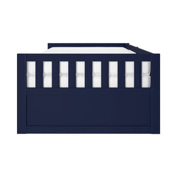 Front view navy blue wooden daybed frame with slatted front panel and white mattress, modern bedroom furniture