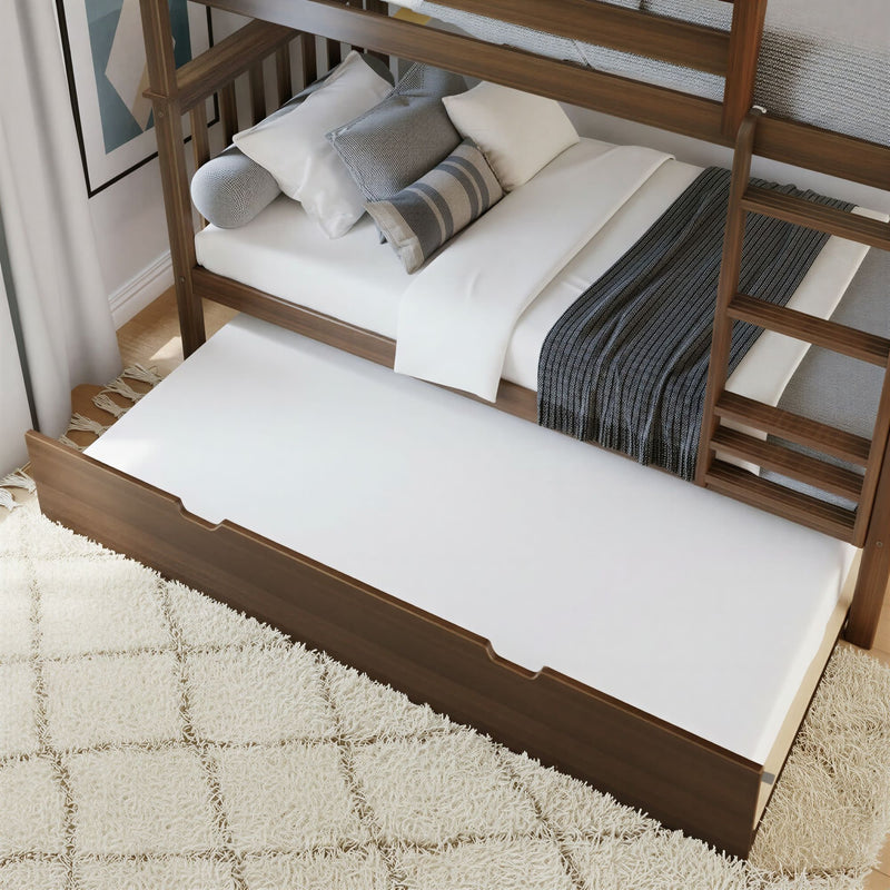 Wooden bunk bed with pull-out trundle, white bedding, gray throw and decorative pillows, ladder and shag rug in modern kids' room