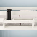 White bed rail shelf with black water bottle, ideal for small storage in loft beds.