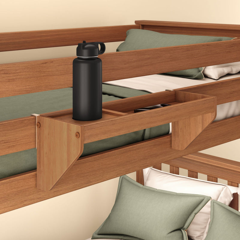 Wooden bunk bed with built-in side tray holding a black water bottle, green bedding, and storage shelf.