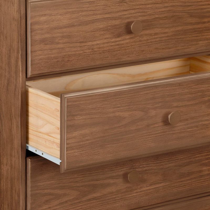 Walnut-finish wooden dresser with one open drawer revealing natural pine interior and metal slide, classic bedroom storage chest