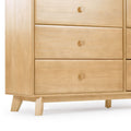 Light natural wood mid-century modern dresser with three drawers, round wooden knobs and angled legs — minimalist chest of drawers for bedroom storage