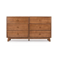 Modern six-drawer wooden dresser with mid-century design in natural finish.