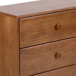 Wooden dresser with two drawers and round handles, featuring a smooth polished finish.