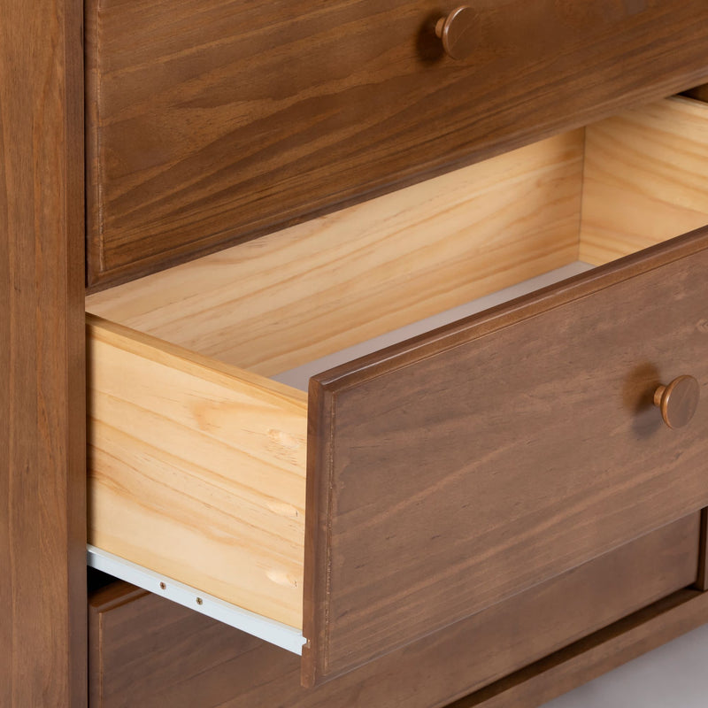 Wooden chest of drawers with an open drawer showcasing natural wood finish.