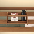 Wooden bed shelf with a book titled "The Old Man and the Sea" and a black water bottle.