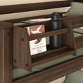 Wooden bunk bed shelf with a black water bottle and a book titled "The Old Man and the Sea" by Hemingway.