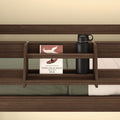 Bookshelf with "The Old Man and the Sea" and a water bottle on a wooden bed frame.