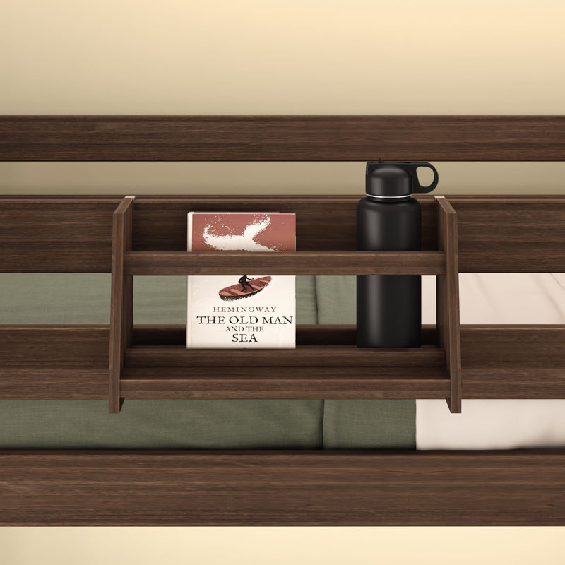 Bookshelf with "The Old Man and the Sea" and a water bottle on a wooden bed frame.
