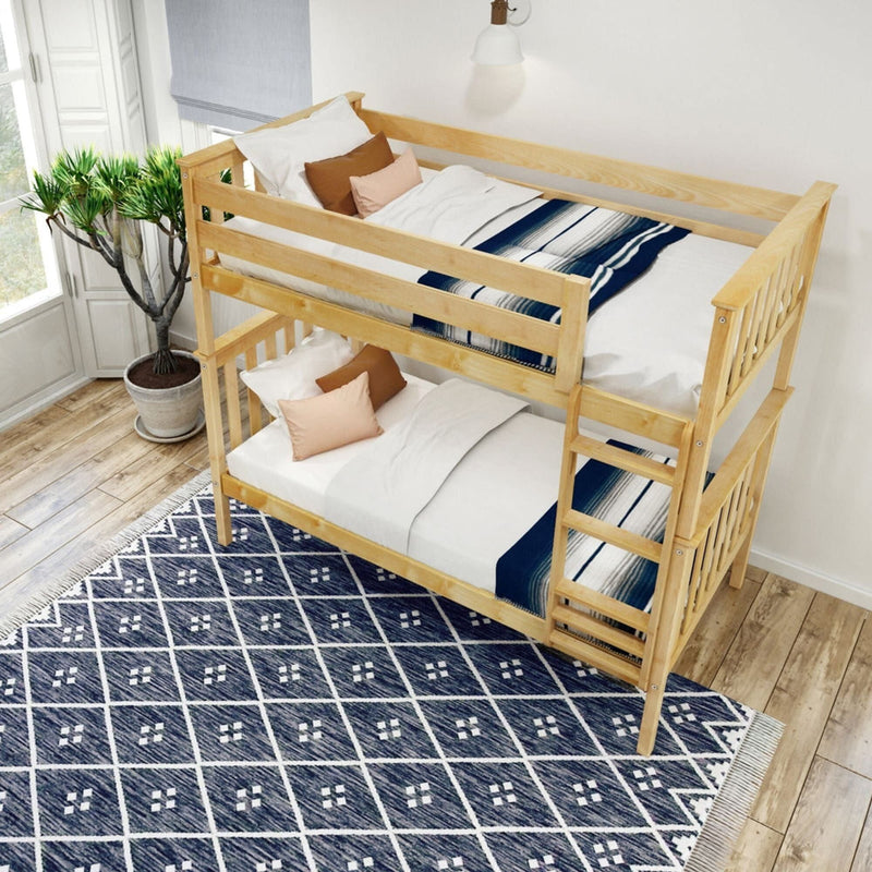 Wooden bunk bed with bedding in a modern bedroom with a patterned rug and indoor plant.