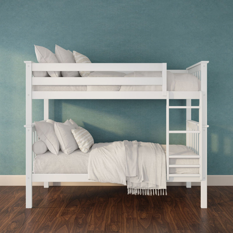 White wooden bunk bed with ladder and neutral bedding against a teal textured wall on dark hardwood floor