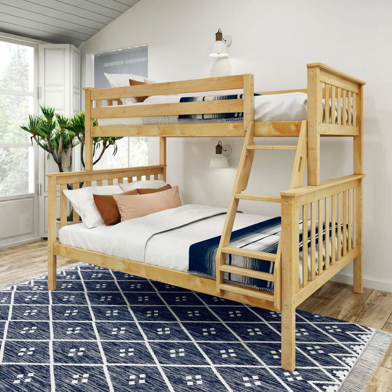 Wooden bunk bed in a modern bedroom with natural light and blue geometric rug.
