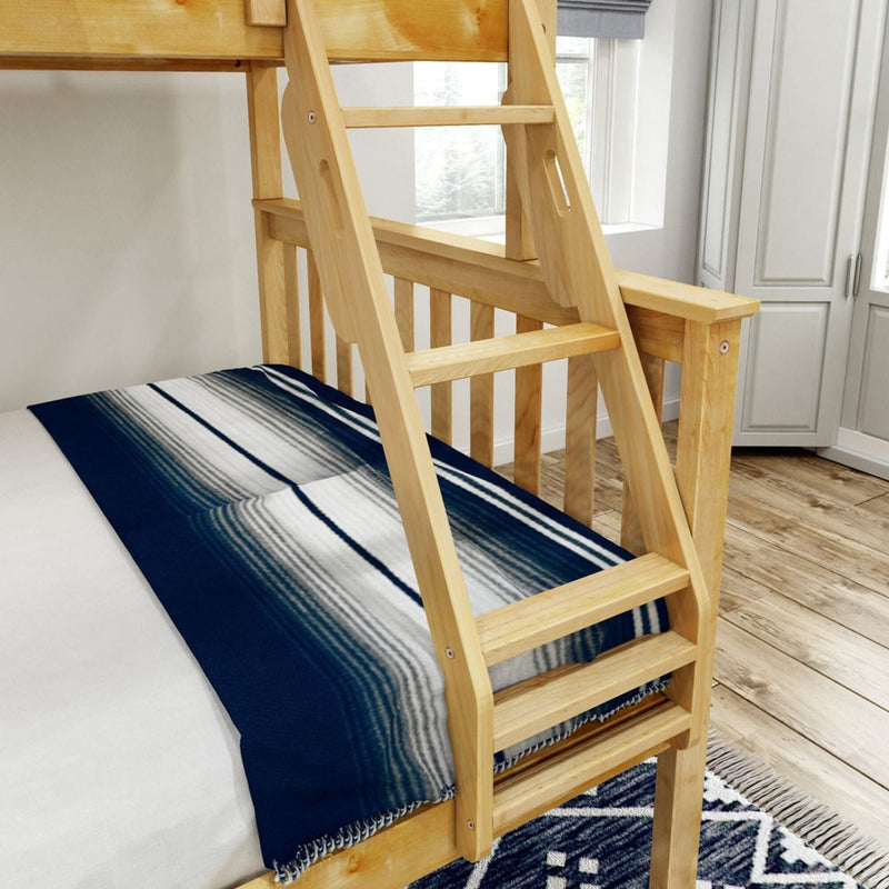 Wooden bunk bed with navy striped comforter in a cozy bedroom setting.