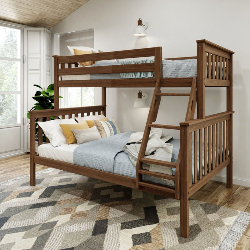 Wooden bunk bed with blue and beige bedding in a modern bedroom with geometric rug and indoor plant.