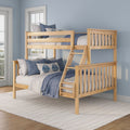 Natural wood bunk bed with blue coastal bedding and ladder in a bright bedroom with light blue walls and windows