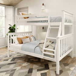 White wooden bunk bed with blue and beige bedding in a cozy, well-lit bedroom featuring a large window and modern decor.