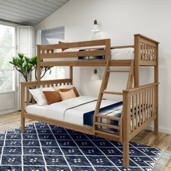 Wooden twin over full bunk bed with ladder in a modern bedroom setting.