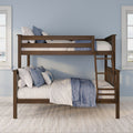 Solid wood twin-over-full bunk bed with ladder, blue and white quilted bedding and pillows in a bright coastal-style kids' bedroom