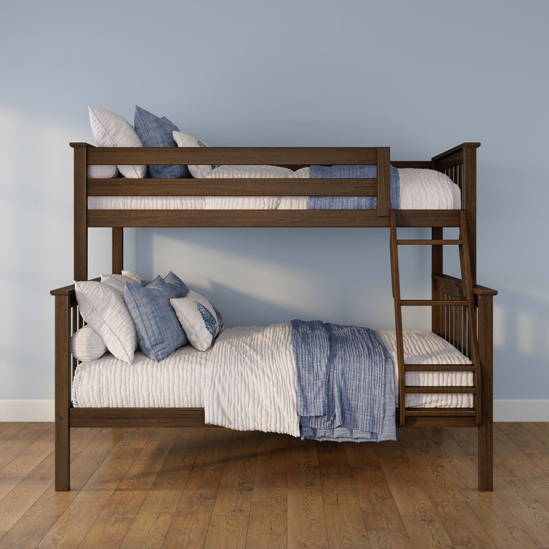 Dark wood twin bunk bed with blue and white quilts and pillows in a modern kids' bedroom