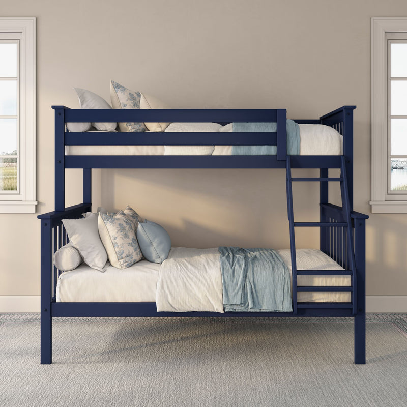 Navy blue wooden bunk bed (twin-over-full) with white and light-blue bedding, floral pillows and ladder against beige wall with windows