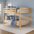 Solid light-wood bunk bed with blue and gray quilted bedding, ladder and safety rails in a bright coastal-style bedroom with large windows