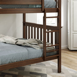 Wooden bunk bed with staircase and blue bedding in a modern bedroom interior.