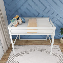 White loft bed with decorative pillows against a blue accent wall in a modern bedroom.