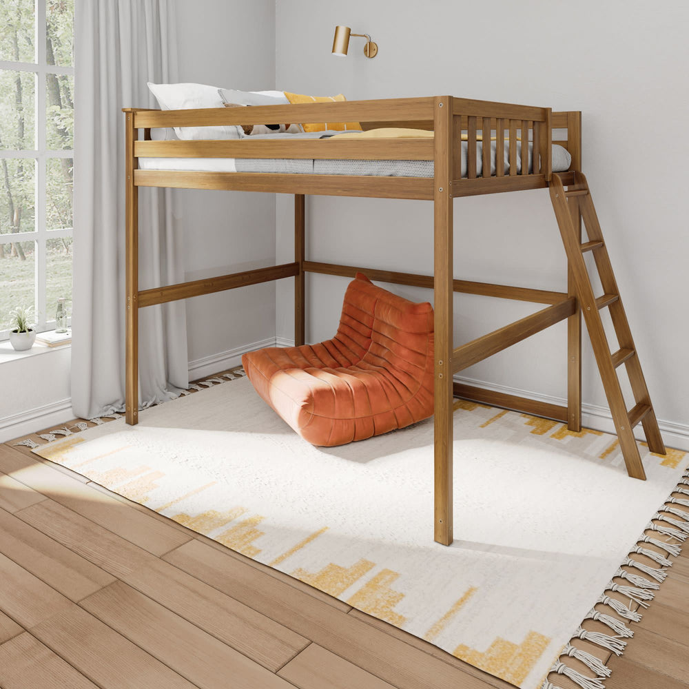 Loft bed with wooden frame and ladder in modern bedroom featuring natural light and an orange lounge chair.