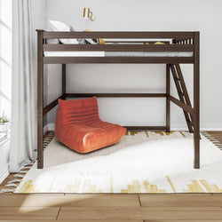 Loft bed with wooden frame and orange lounge chair underneath on patterned rug in modern bedroom.
