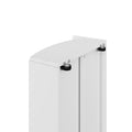 Close-up of white vertical radiator corner with black caster wheel, metal bracket and removable top cover