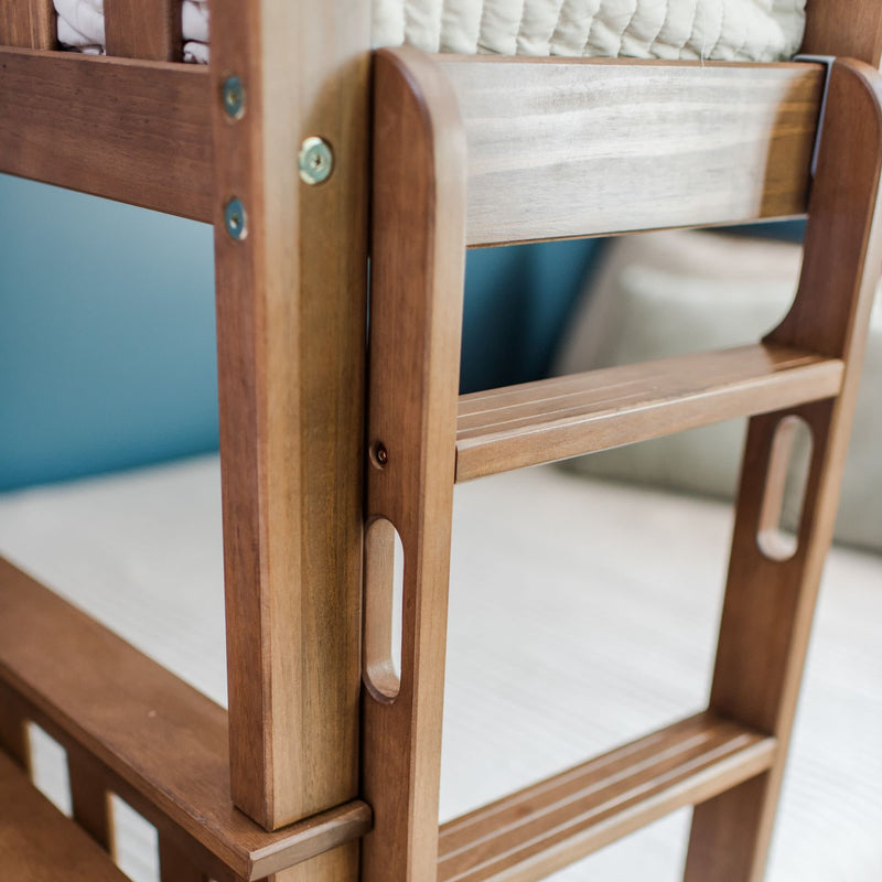 Wooden bunk bed ladder with close-up detail on screws and finish.