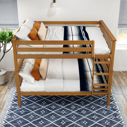 Wooden bunk bed with cozy pillows and patterned blanket in a bright bedroom.