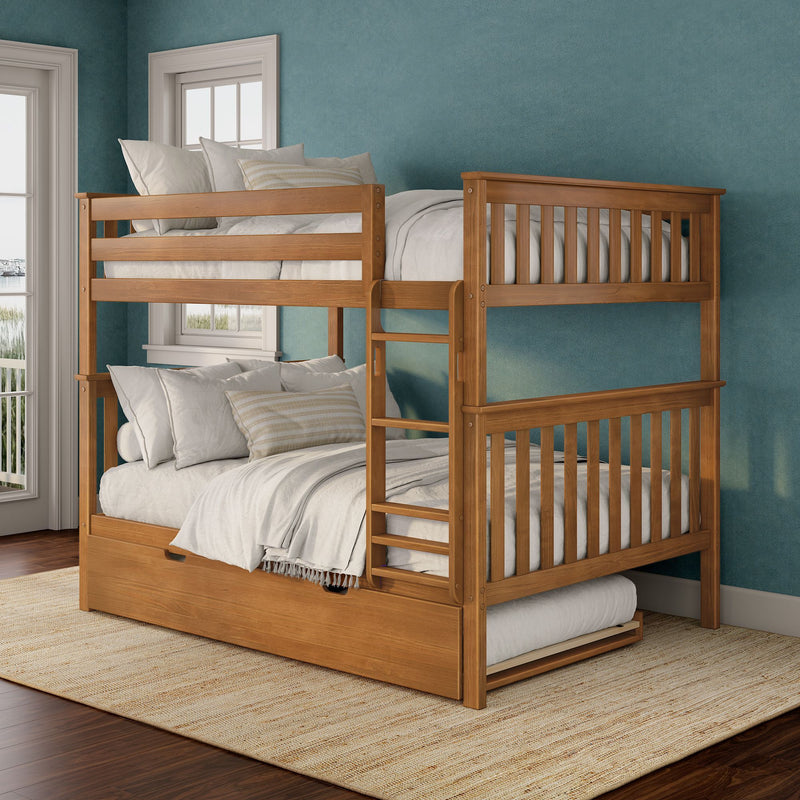 Solid wood twin-over-full bunk bed with trundle and storage drawer, white linens and ladder against a teal accent wall in a cozy kids' bedroom