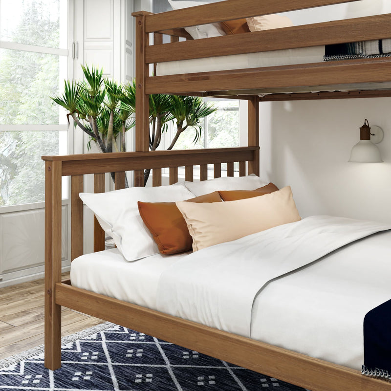 Modern wooden bunk bed with white bedding and decorative pillows in a bright room.