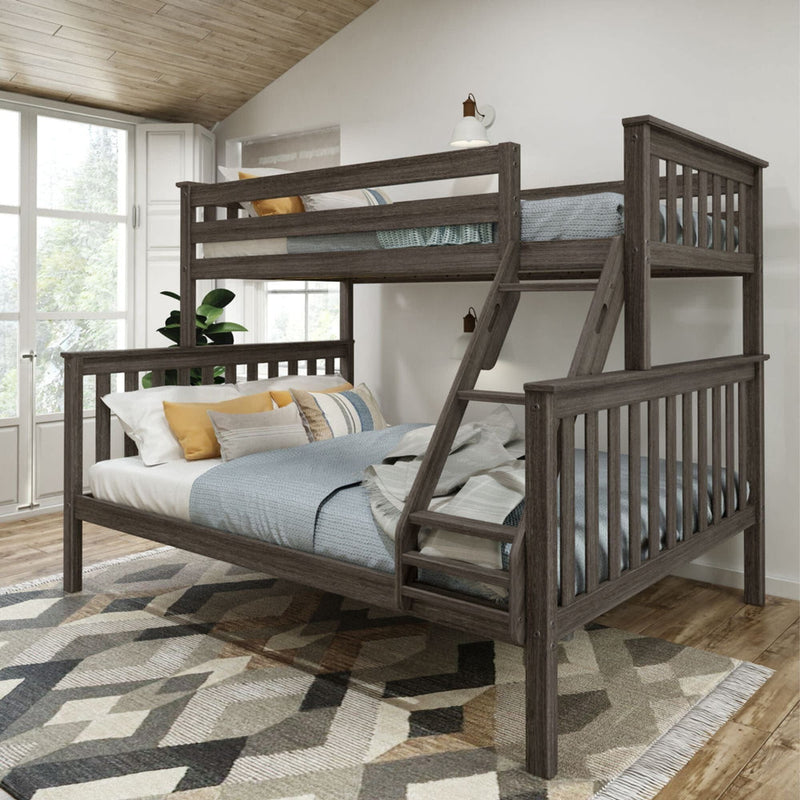 Rustic wooden bunk bed with ladder in modern bedroom setting, featuring cozy bedding and geometric patterned rug.