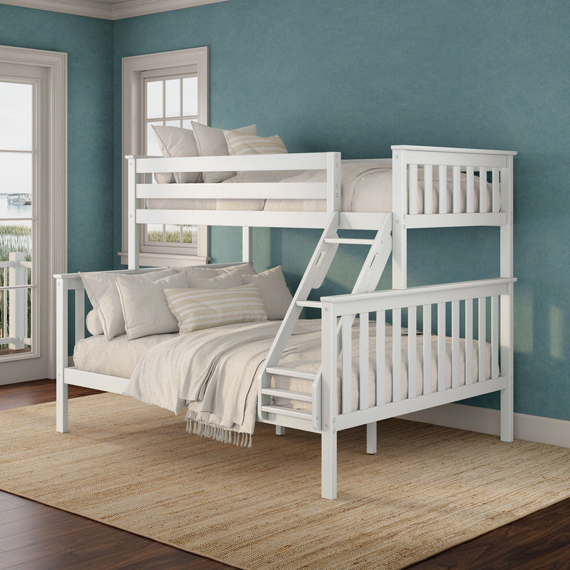 White wooden twin-over-full bunk bed with ladder and beige bedding in a coastal teal kids' bedroom with large windows and jute rug