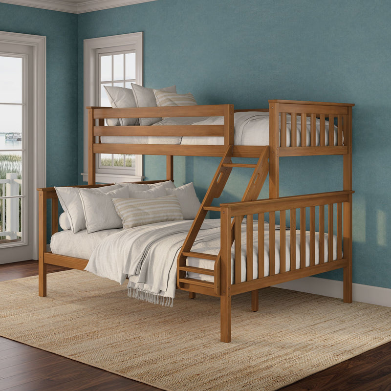 Solid wood bunk bed with ladder and white bedding in a coastal-style bedroom featuring teal textured walls, large paned windows, a natural jute rug and hardwood floors