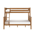 Twin-over-full solid oak wood bunk bed with ladder and slatted rails in natural finish and white mattresses, modern kids bedroom