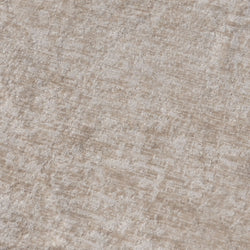 Beige textured carpet close-up with subtle geometric pattern, plush neutral living room rug ideal for modern home décor