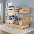 Natural wood bunk bed with ladder and pull-out trundle, blue and gray bedding and leaf-pattern pillows in a coastal kids' bedroom