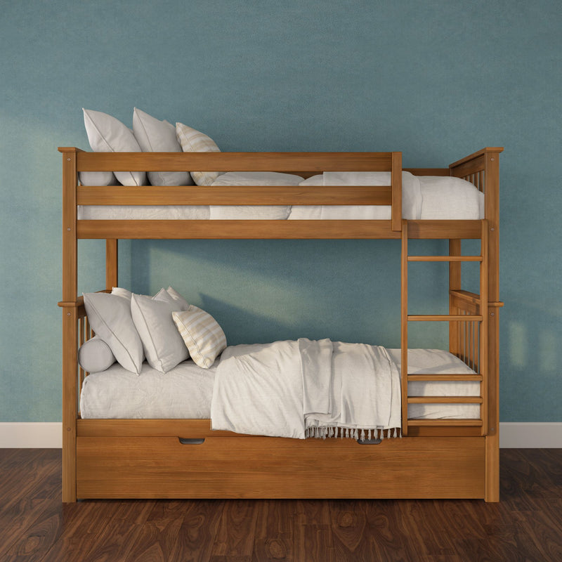 Solid wooden bunk bed with ladder and under-bed storage drawers, white linens and pillows against a teal textured wall on hardwood floor