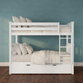 White wooden twin-over-twin bunk bed with ladder and underbed storage drawer, neutral beige bedding and pillows against a teal textured wall in a modern kids bedroom
