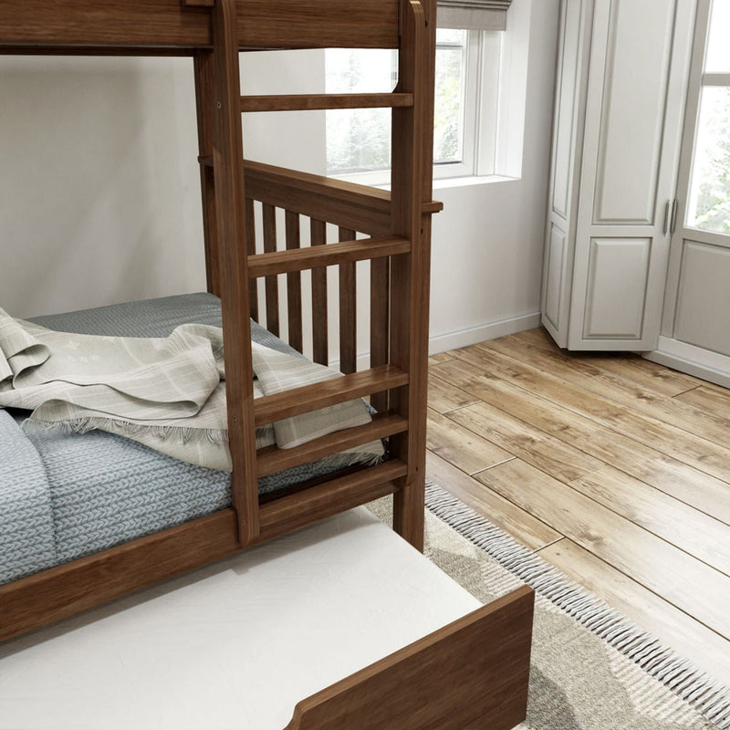 Wooden bunk bed with storage drawer in a bright, modern bedroom featuring hardwood floors and white cabinetry.