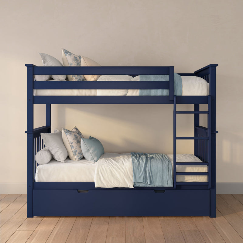Navy blue wooden bunk bed with twin-over-full layout, built-in storage drawer and cozy blue-and-cream bedding in modern kids' bedroom