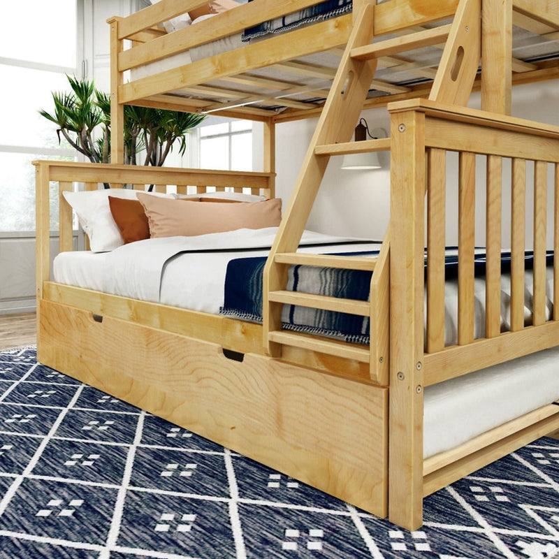 Wooden bunk bed with comfortable bedding and blue patterned rug in a well-lit bedroom.